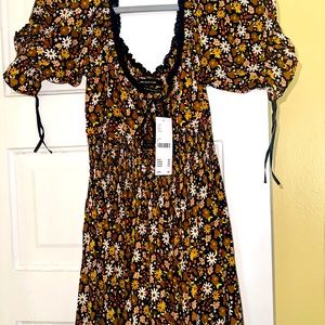 BNWT. Adorable floral romper.